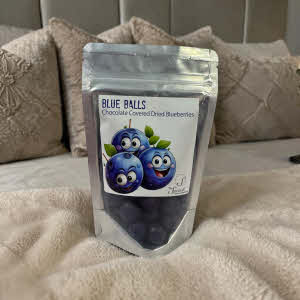 Blue Balls Package on Bed with Pilliows